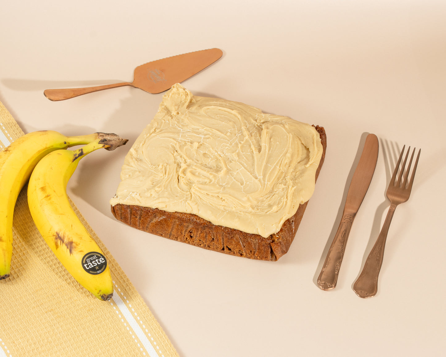 Homemade Luxury Banana Bread |
GREAT TASTE Award Winning | Walnut & butterscotch frosting | THE HAPPY BAKERY CO.